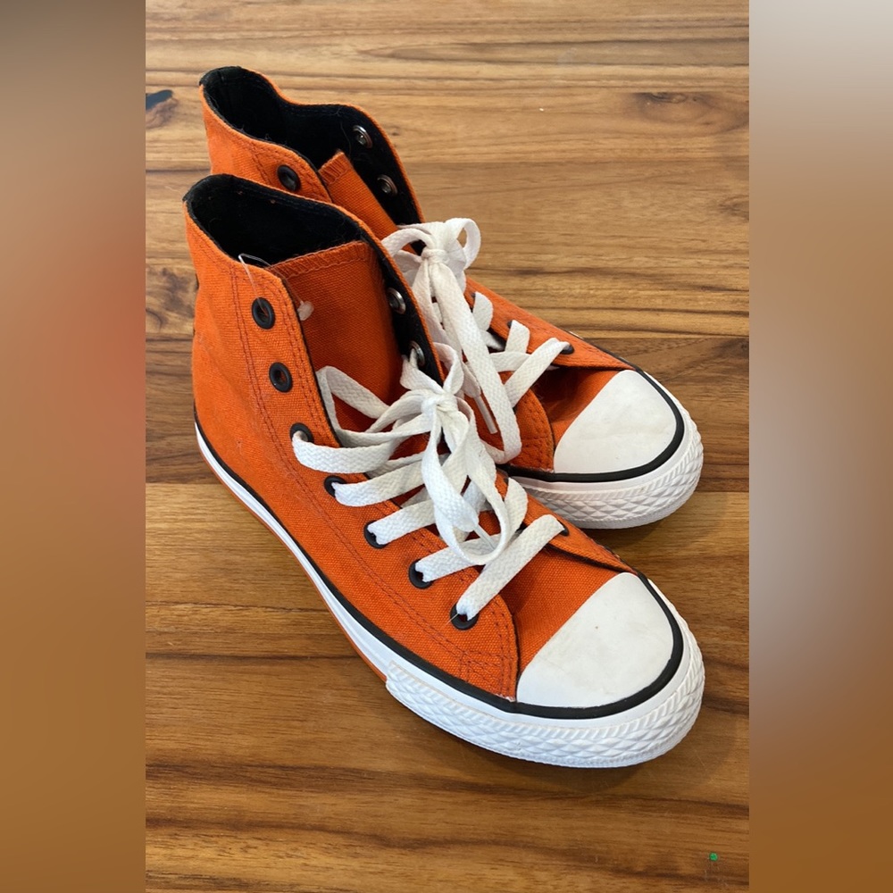 Orange converse shoes, never worn. No tags.